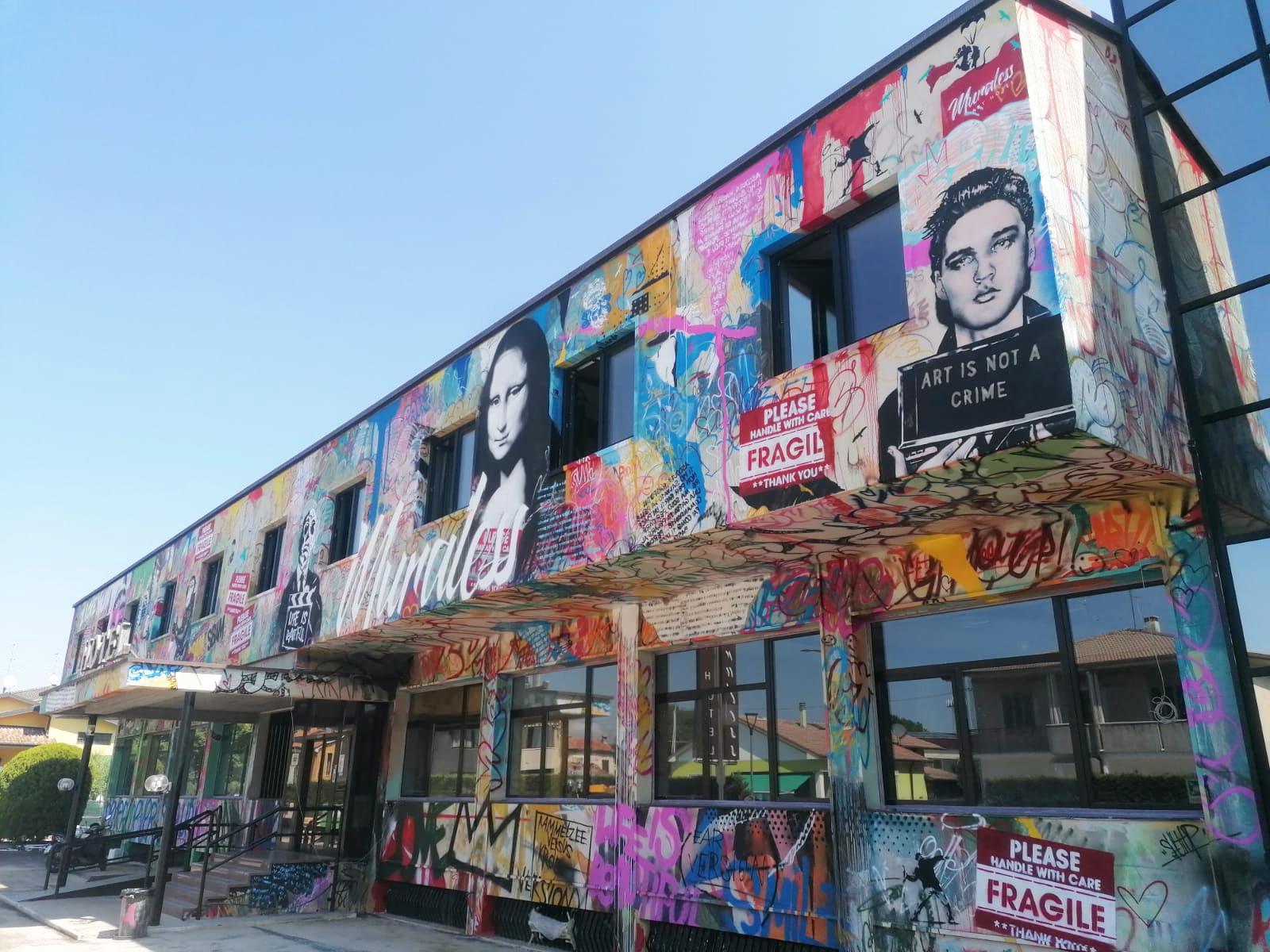 Muraless Art Hotel, the facade created by Mr. Brainwash