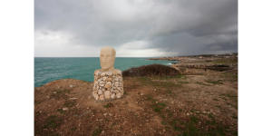 Italian coast - sculpture on a rock pedestal, S. Maria di Leuca