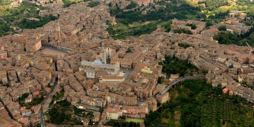 Siena, surrounded by the green hills 